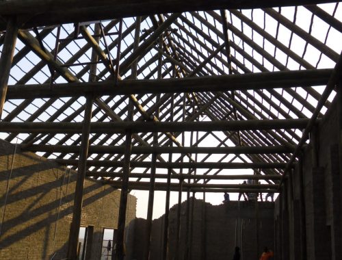 Installing Pole Structure of Large Thatch Roof, Eastern Cape