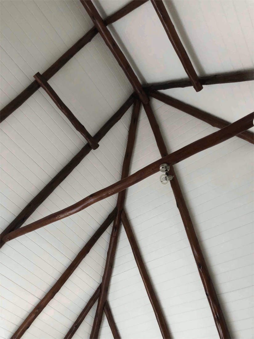 Ceiling boards were installed on the outside of the poles